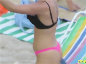 pinkish bikini amateur without bra voyeur Beach ladies