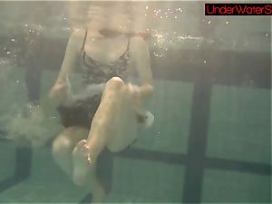 Blackhaired bombshell Irina underwater